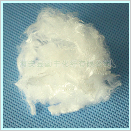Flame retardant polypropylene staple fiber
